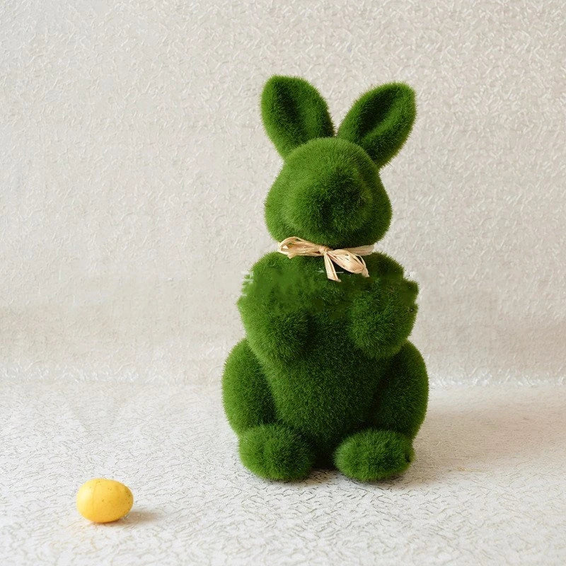 Realistic moss-covered Easter bunny decoration made from lightweight foam and artificial grass