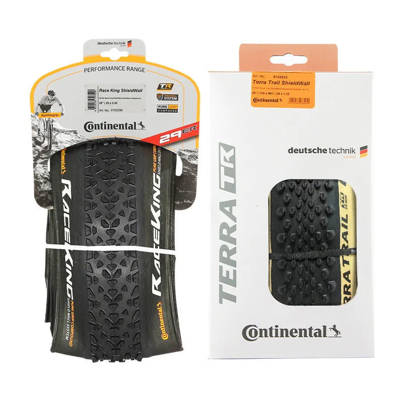 Mountain bike folding outer tyre shown in yellow, with size markings for 27.5x2.2 visible.
