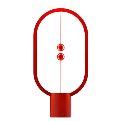 Magnetic bedside night light with ball activation system and adjustable brightness settings