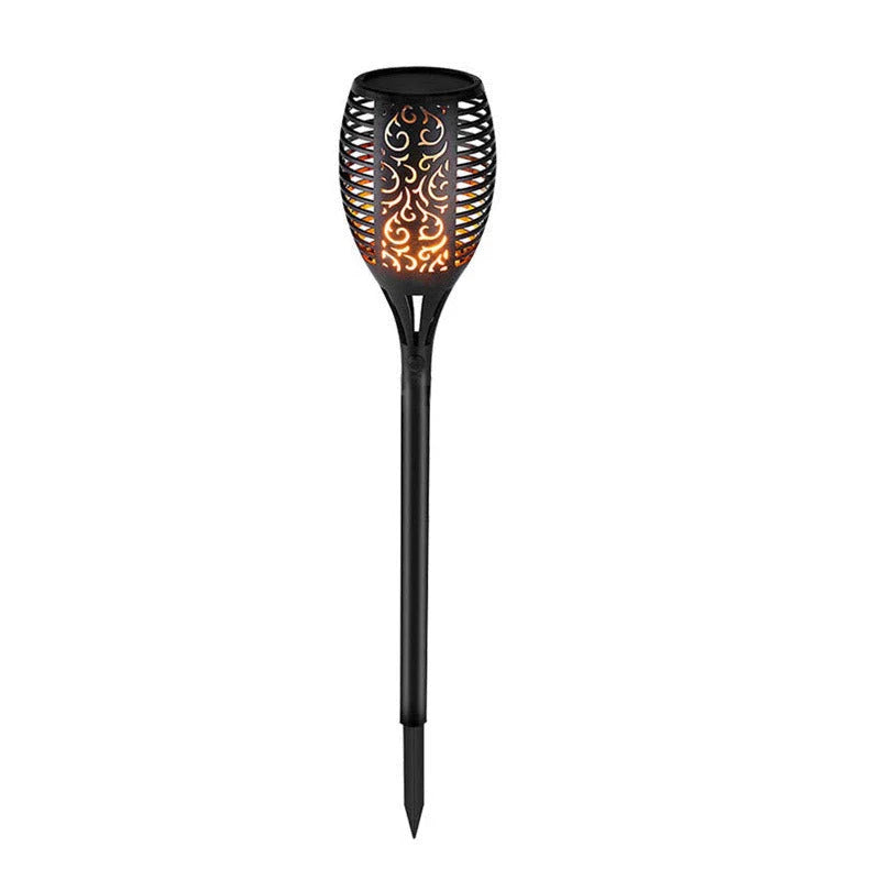 Solar-powered outdoor torch lights with vibrant LED displays automatically illuminating a garden pathway at night