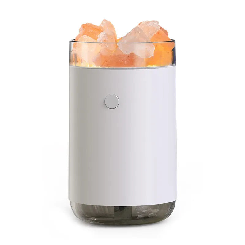 Ultrasonic humidifier diffuser with crystal salt stone and LED lamp in white finish on a desk with USB cable