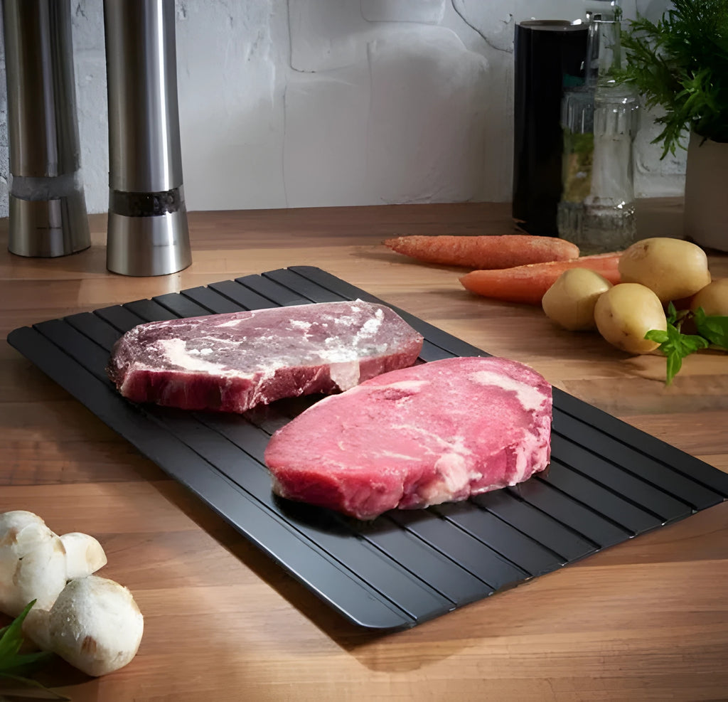 Black aluminium kitchen defrosting tray for thawing frozen food without electricity