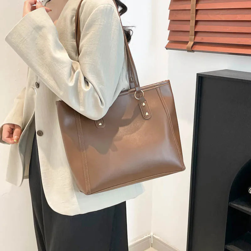Korean style square horizontal shoulder underarm bag in PU leather with a sandwich pocket.
