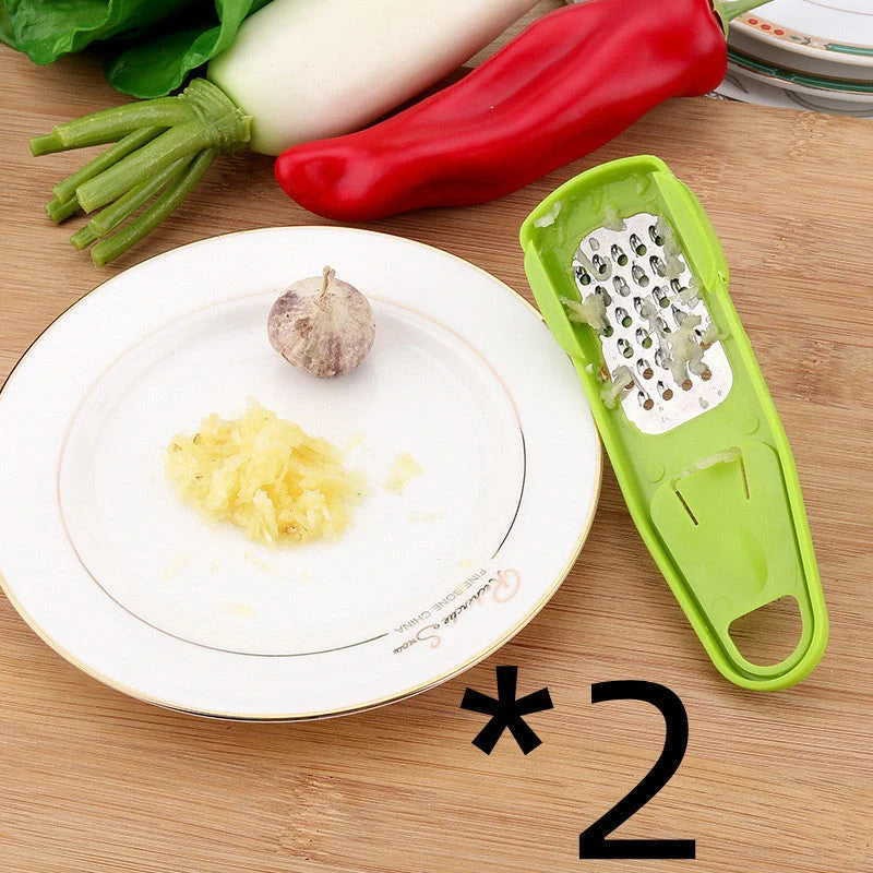 Eco-friendly garlic masher and seasoning grinder in rose red and light green