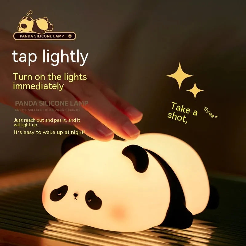 Cartoon panda-shaped night light made from blue silicone with clap activation feature