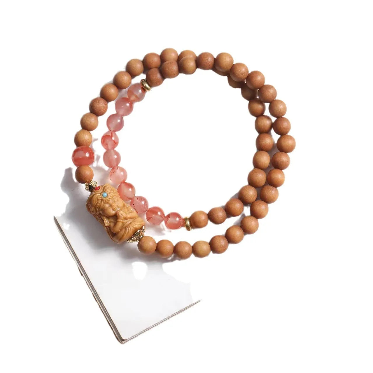 Brown wooden bracelet with 6mm round beads featuring double circle pattern