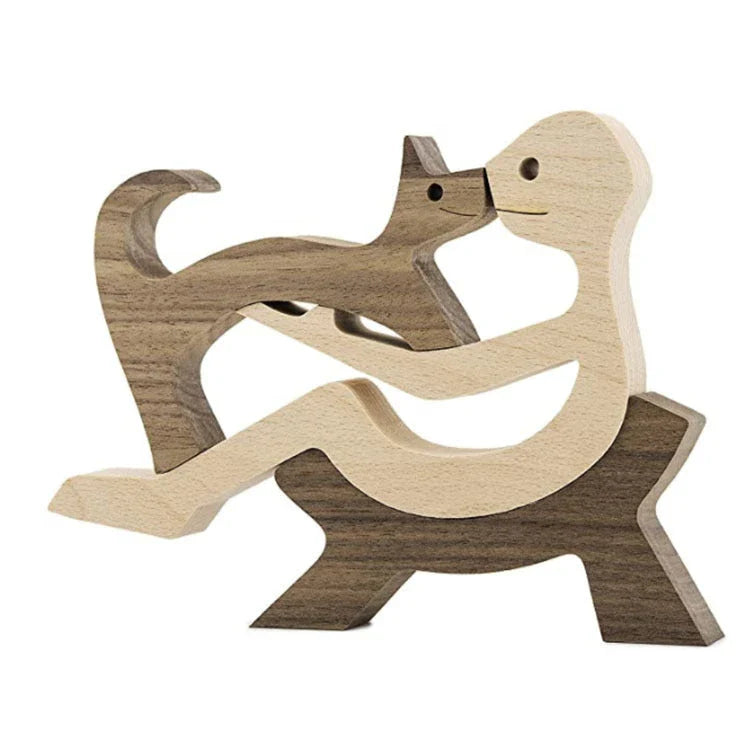 Handcrafted wooden dog sculpture featuring a man and his loyal canine companion