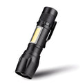 Black aluminium alloy mini telescopic LED flashlight with pocket clip, shown extended and retracted.