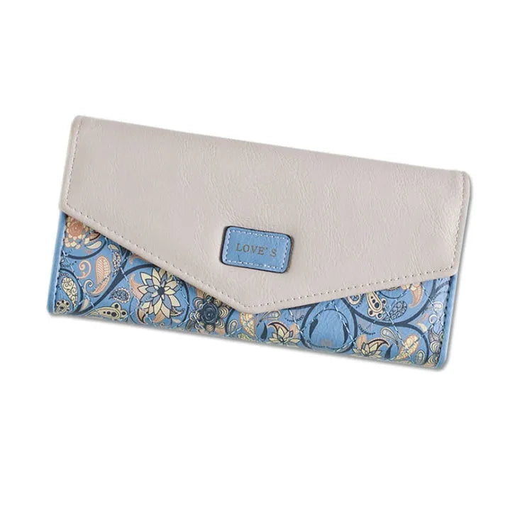 Large three-fold women's wallet with buckle and coin purse in black, blue, green, melon red, violet.