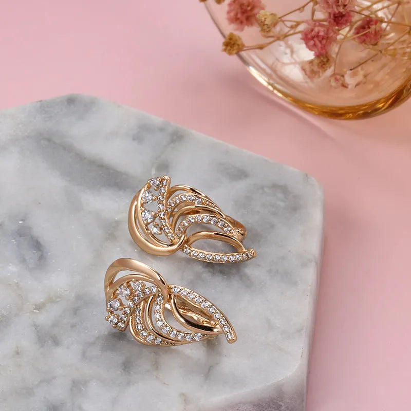 Women's copper U-shaped ear clips with wing design and micro zircon stone detailing in H0195 colour