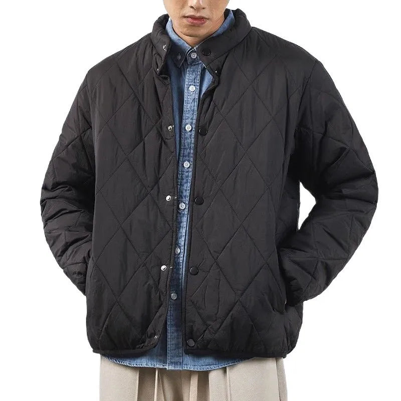 Men's black diamond lattice pattern winter jacket with lengthened cut on mannequin