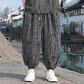 Men's thin knit short-sleeve suit with loose cropped trousers in black and grey colour options