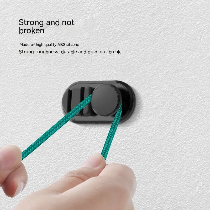 ABS silicone car and indoor cable storage hook in dark green measuring 52mm x 27mm