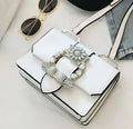 Women's designer diamond lock shoulder bag in quality PU leather, available in Black and Blanco colour options