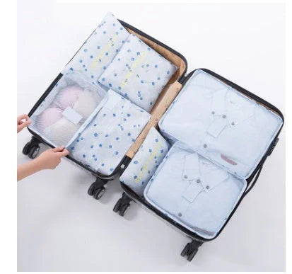 Durable waterproof packing cubes in various colors for organized, efficient travel