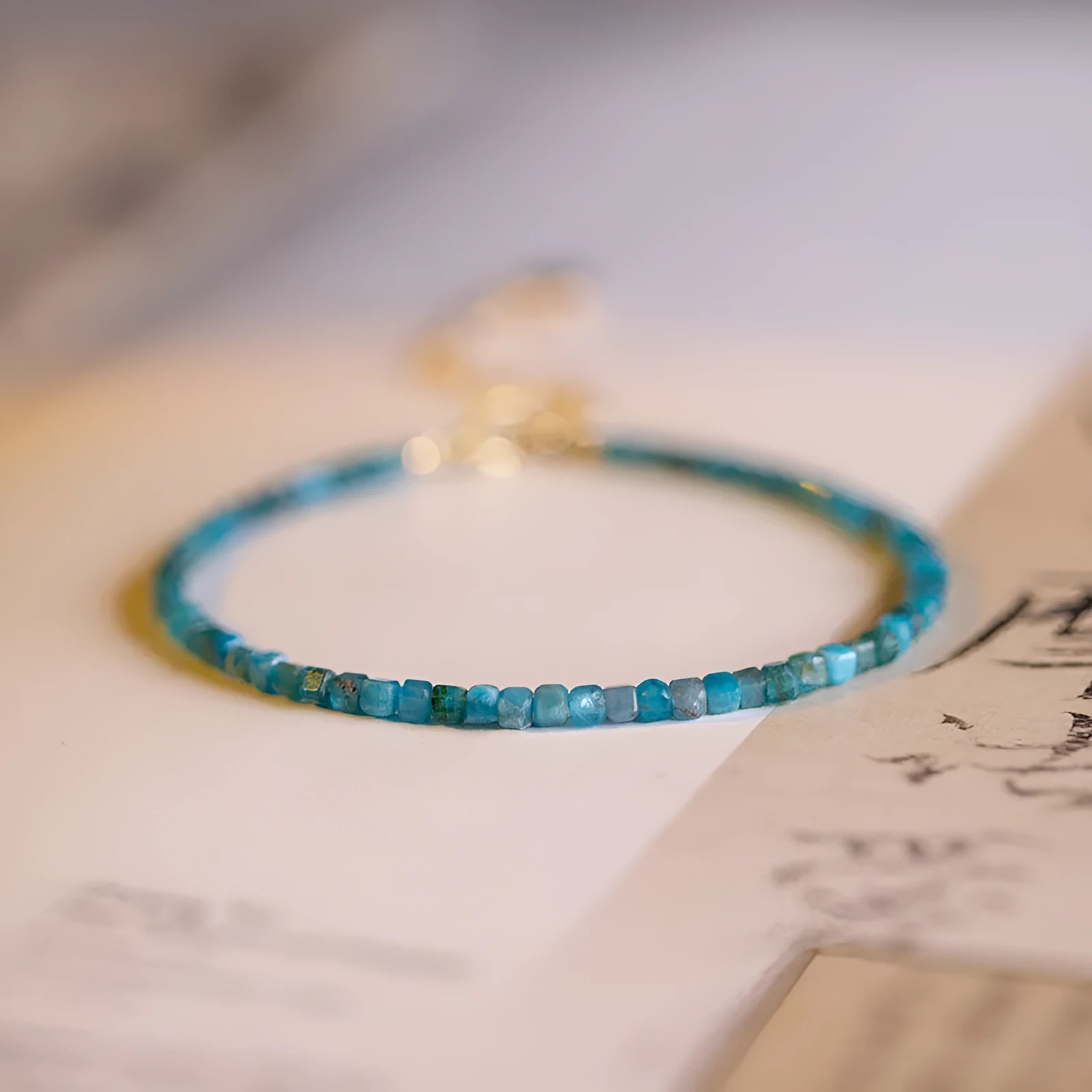 Adjustable women's bracelet with natural blue apatite crystal diamond-shaped beads