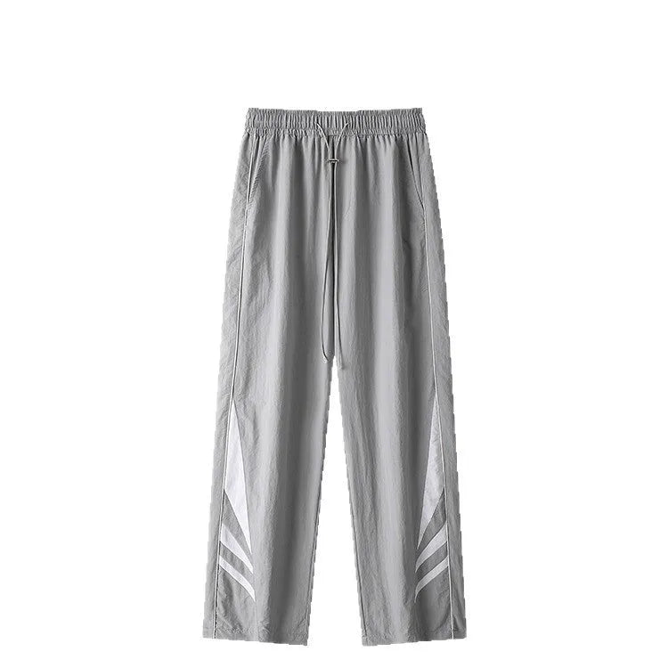 Men's black straight leg plus size casual sports trousers on a hanger.