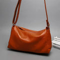 Women's soft genuine leather crossbody shoulder bag in horizontal square shape with strap and handle