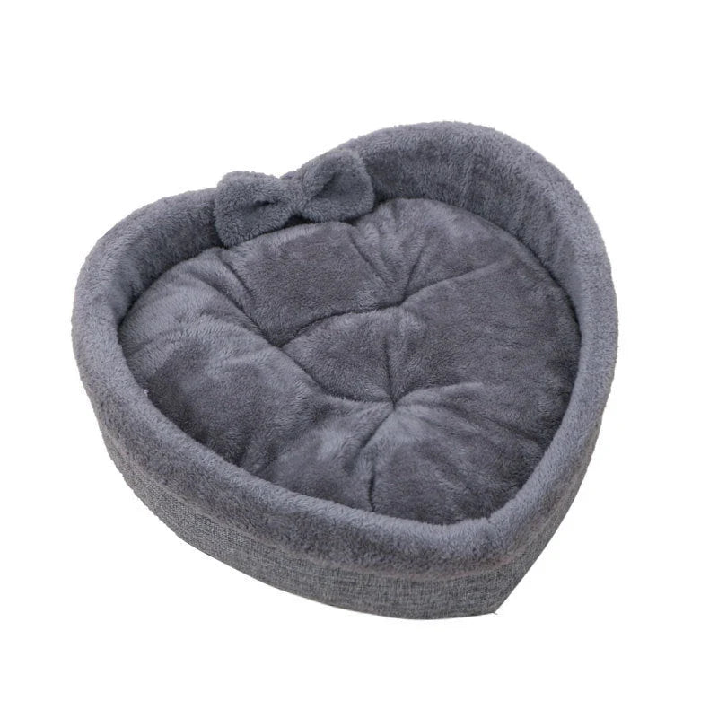 Cozy heart-shaped pet bed in grey and pink colors, designed for small, medium, and large dogs and cats