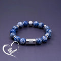 Bodhi seed ethnic bracelet with geometric patterns in black and white Qiankun design