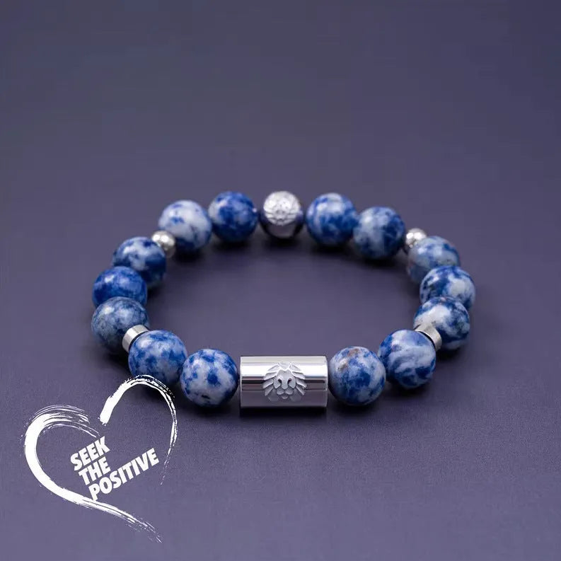 Bodhi seed ethnic bracelet with geometric patterns in black and white Qiankun design
