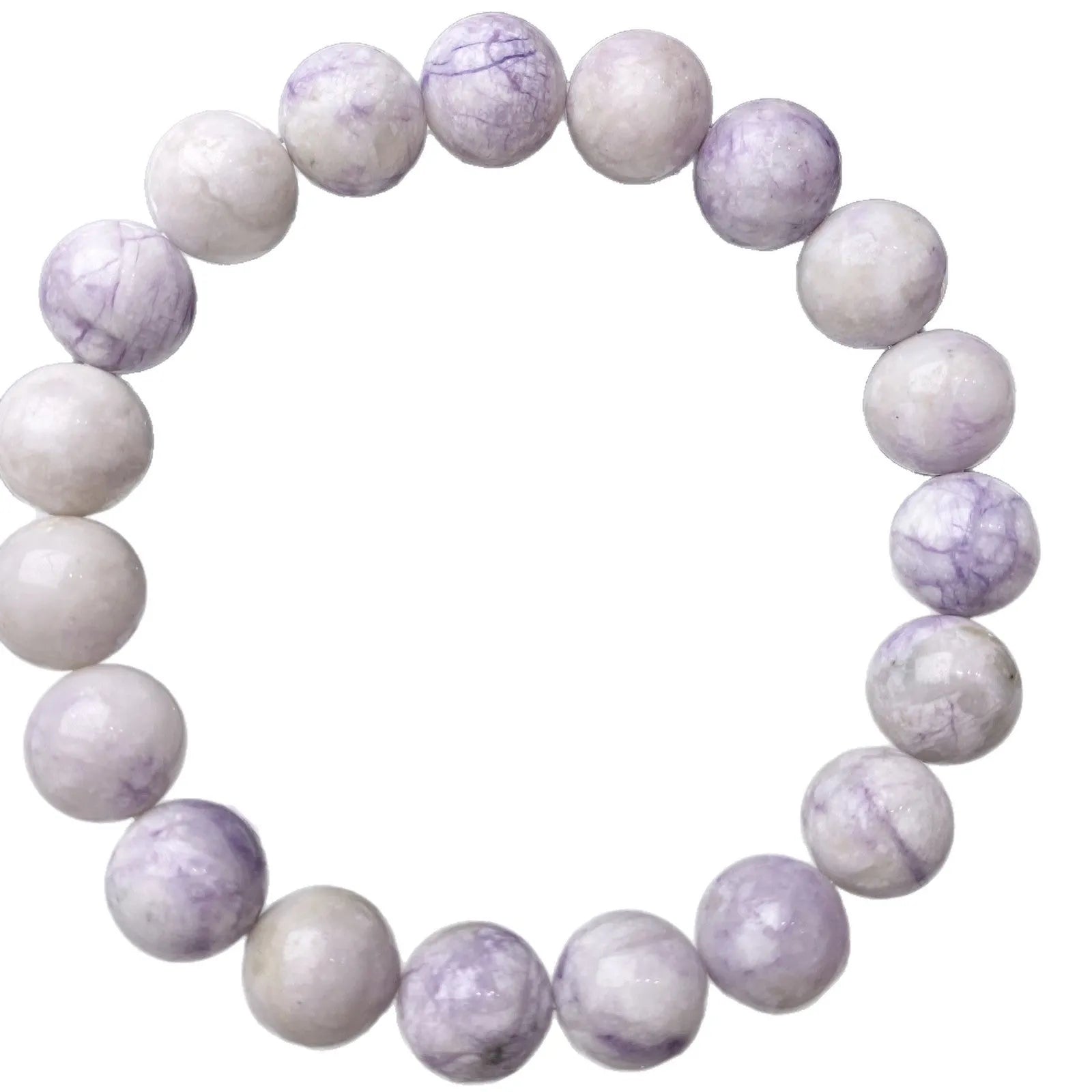 Women's purple turquoise bracelet with natural gemstone beads on a wrist.