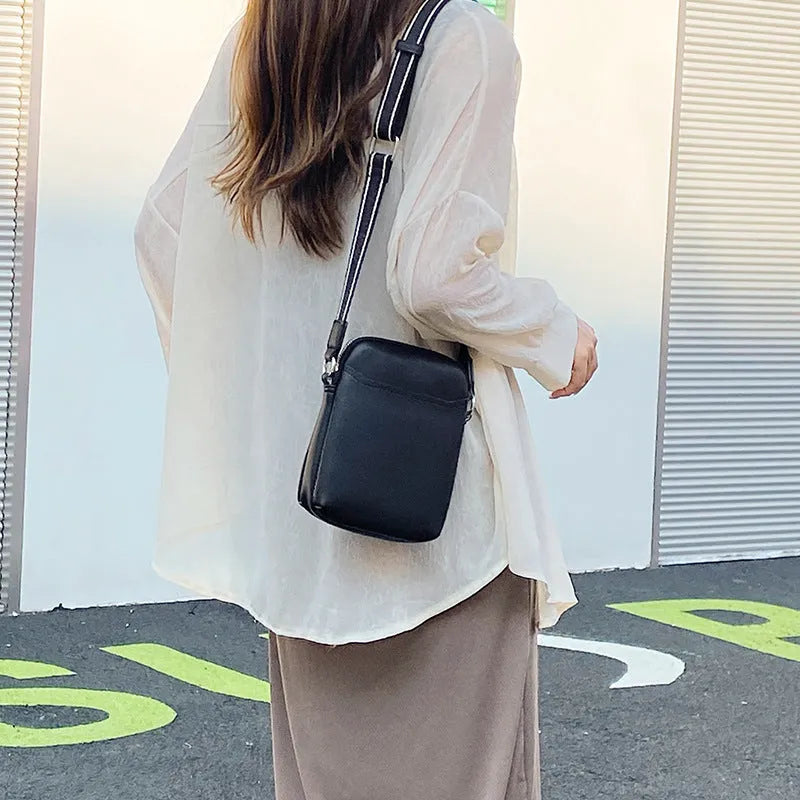 Solid colour PU leather crossbody phone bag in beige, shown with strap.