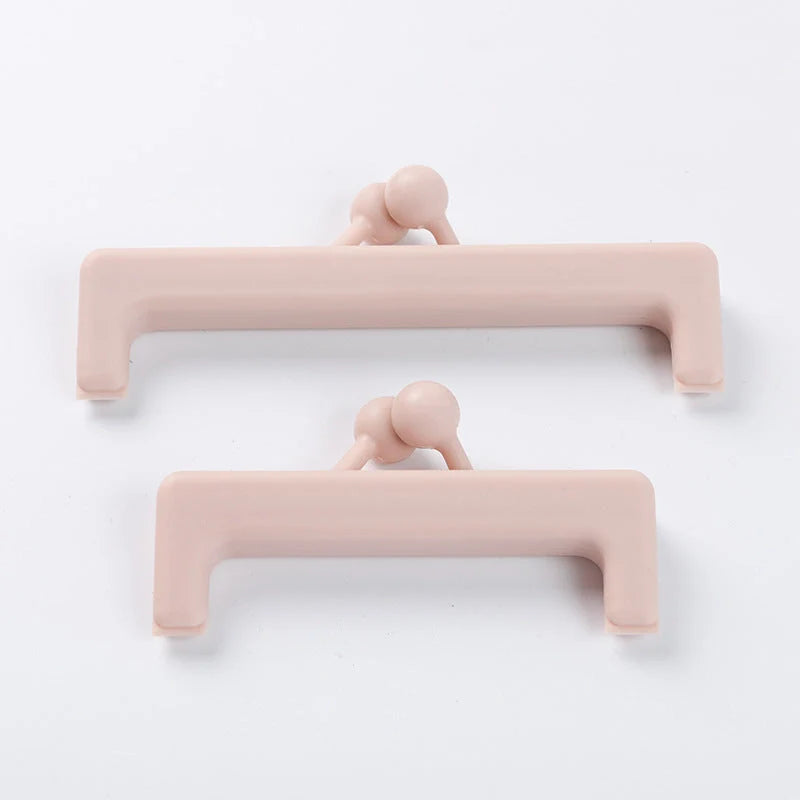 Push-button plain food bag sealing clips in blue and pink