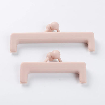 Push-button plain food bag sealing clips in blue and pink