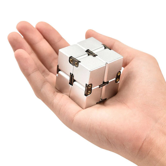 Infinity Cube Educational Toy in zinc alloy, available in multiple colours for focus enhancement and stress relief.