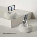 Adjustable rotating desk bracket holding a tablet, showing height extension and clamp mechanism.