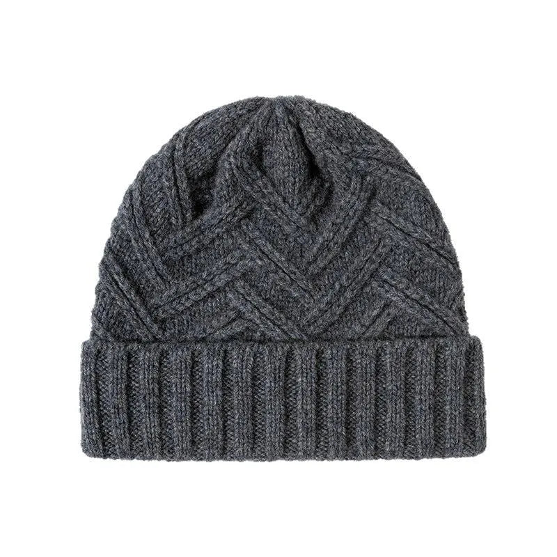 Wool knitted dome hat in ankela red colour with totem pattern detail