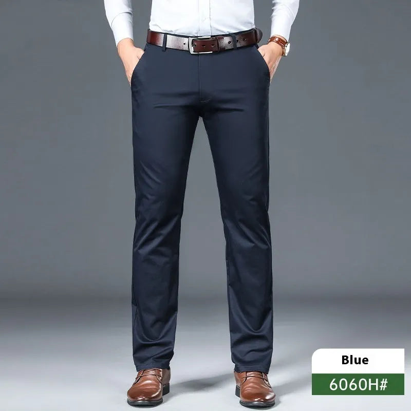 Men's straight-leg non-ironing trousers in a grey cotton blend fabric on a hanger