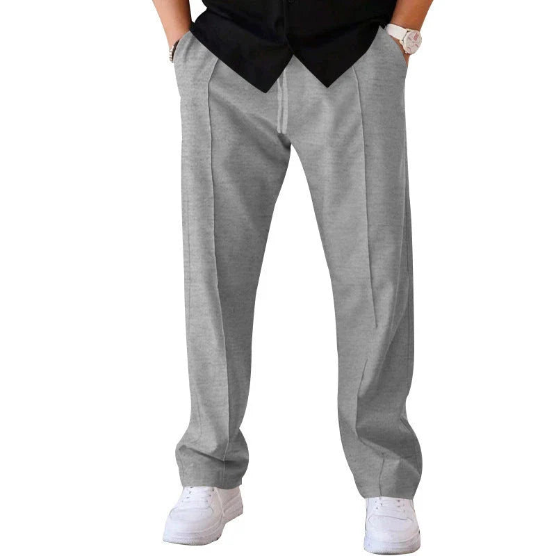 Men's drawstring waist casual pants in a variety of colors featuring a unique bright line design