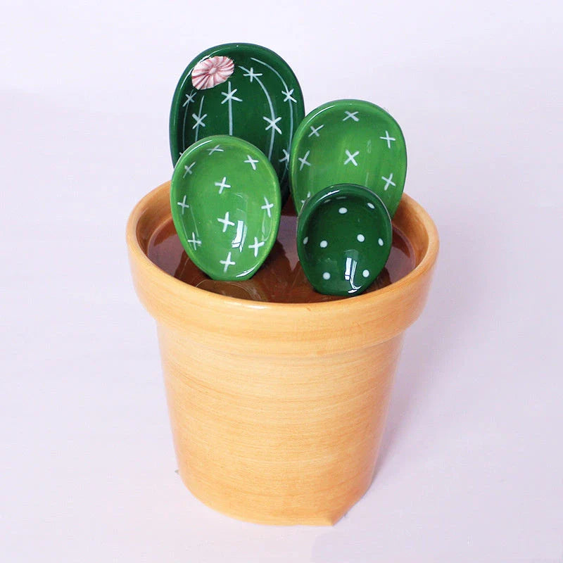 Ceramic measuring spoon set with cactus-inspired base in vibrant colors, perfect for baking and cooking