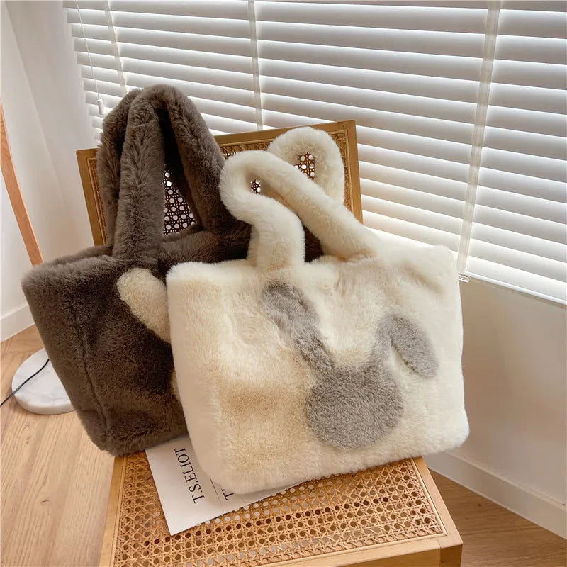 Soft plush tote bag with cartoon rabbit ears in one of six solid colours.