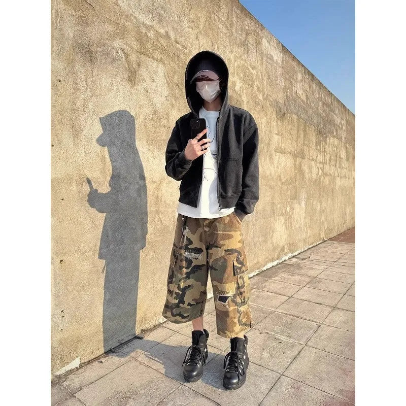 Men's camouflage coloured cropped jeans with ripped detailing and straight leg loose fit
