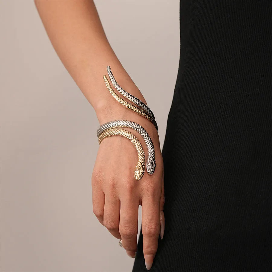 Gold twisted snake bracelet and ring jewellery set with exaggerated winding design