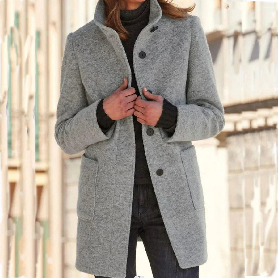 Stylish wool coat with stand collar and pockets, available in various colors for casual fall and winter wear.