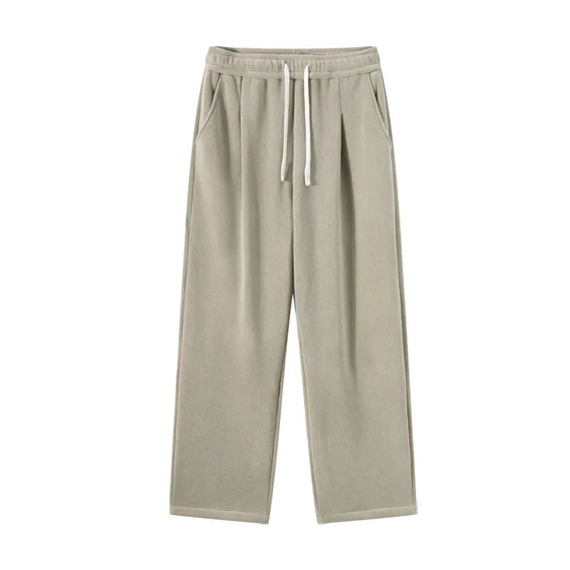 Men's double-sided polar fleece winter trousers in apricot colour showing loose Korean style and drawstring waist