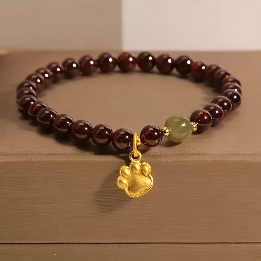 Women's adjustable crystal bracelet with Cat's Paw garnet colouration and original design