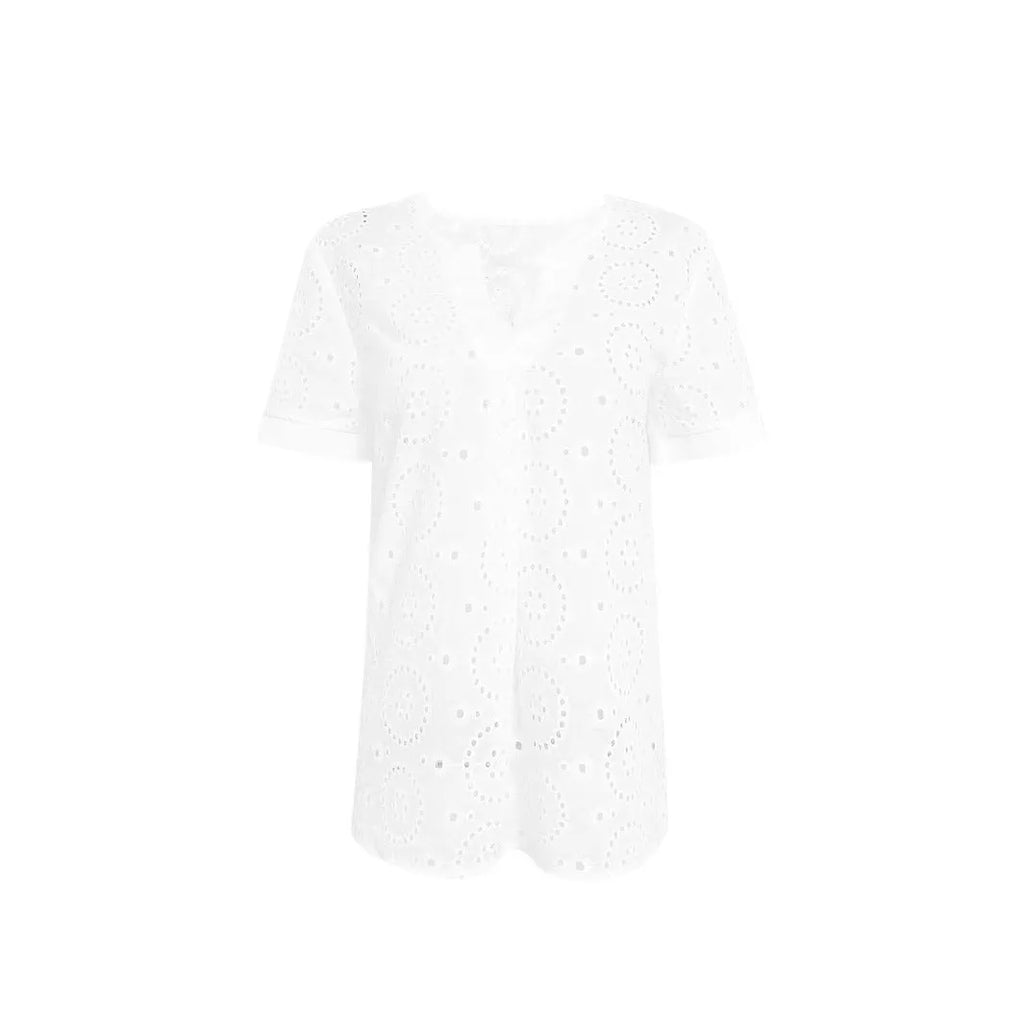 White women's V-neck t-shirt with hollow out detail and short sleeves on a hanger.