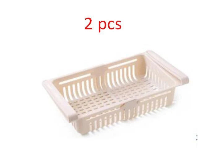 Stretchable refrigerator storage basket in white, blue, pink, and apricot colours