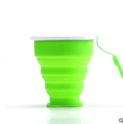 Collapsible stainless steel travel water cup showing expanded and compressed states