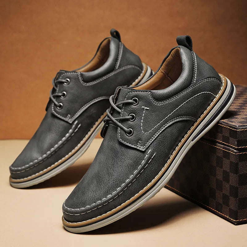 Men's black genuine leather casual shoes with round toe and front lace-up design