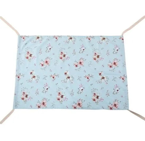 Portable crushed velour baby hammock attached to a crib, shown in pink colour.