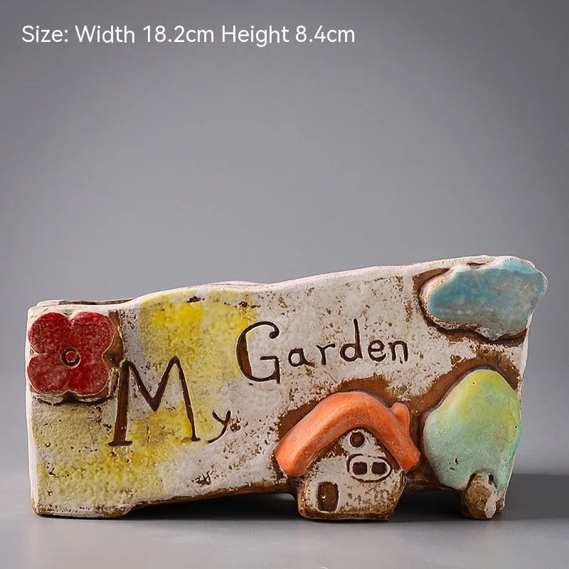 Hand-painted ceramic flower pot with pastoral design and large planting area