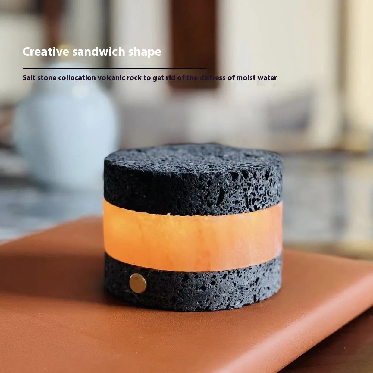 Small orange volcanic rock USB night lamp with warm light, shown next to a USB cable