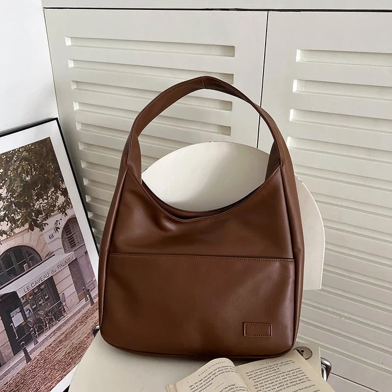 Large capacity PU tote bag for women in brown, black, and white with sewing thread detailing
