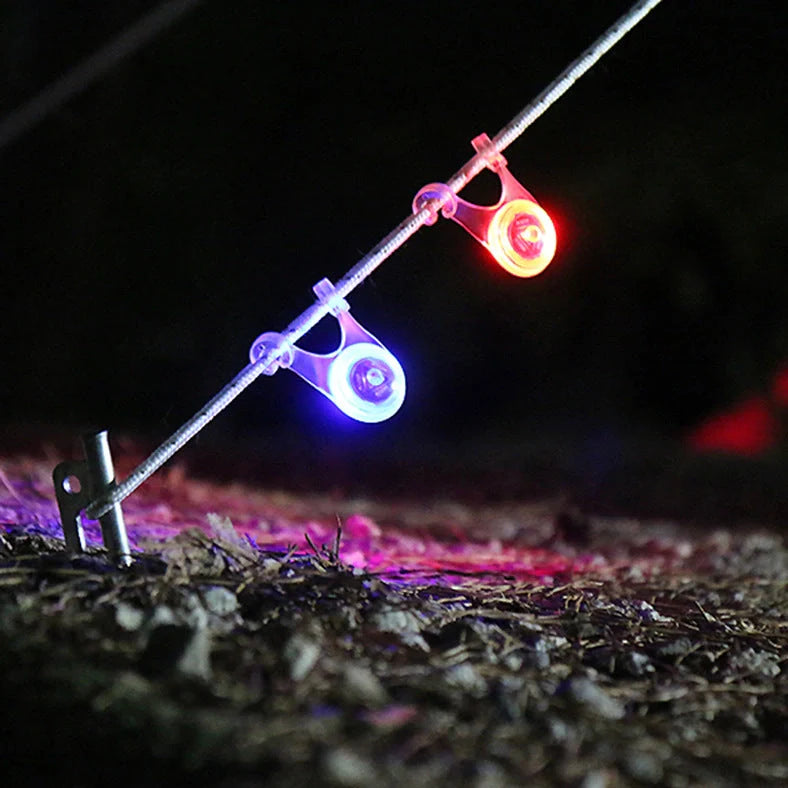 Camping safety light for tent rope hanging: 5.8x3.5x6cm compact LED lamp with 3V CR3032 battery, weighing 25g for minimal pack weight and easy press-switch operation